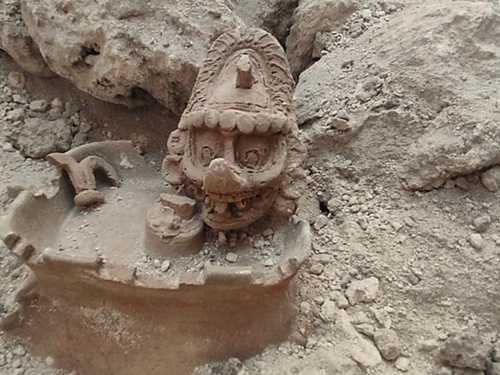 Hallan en ruta del Tren Maya una cabeza de K’awiil, deidad poco representada